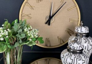 Wall Clock - Gold Metal Finish - Roman Numerals - Linen Background